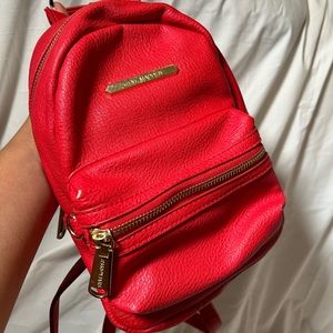 Red Steve Madden mini backpack